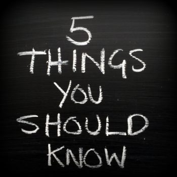 The phrase Five Things You Should Know written in white chalk on a blackboard as a reminder to prepare and set priorities