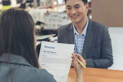 Two people chatting in a job interview.