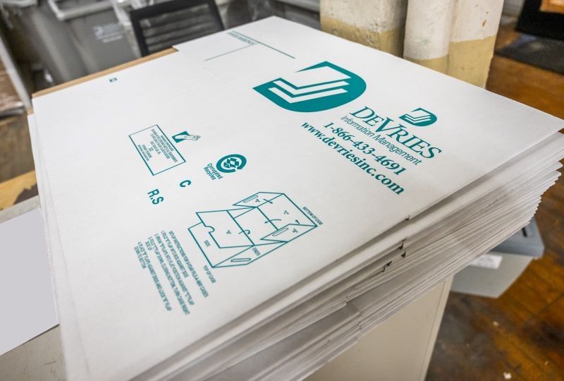 A neat stack of clean, flat boxes ready to be assembled