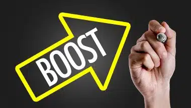 A hand is shown holding a marker next to the word BOOST inside of an upward arrow graphic.