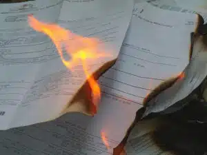 Documents burning in flames.