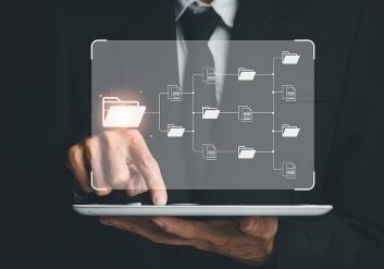 Businessman working on digital tablet document management system