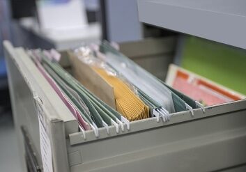 file folder documents In a file cabinet retention concept business office equipment
